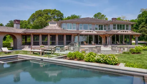 Rear elevation looking over the infinity-edge pool.
