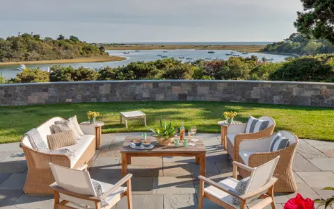 Sit on the terrace and enjoy the views out to the river, dunes, beach, and open ocean.