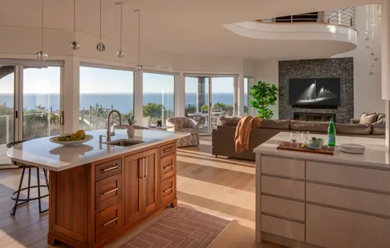 Main living spaces open to each other and the ocean view.